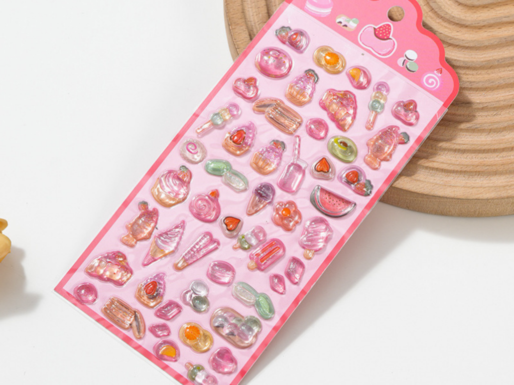Candy and dessert designs on a pink 3D bubble sticker sheet