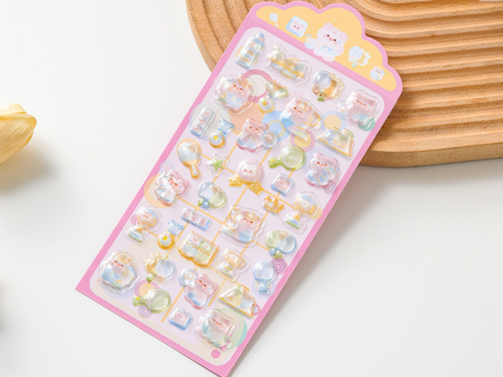 Pastel 3D bubble stickers displayed on a pink backing card