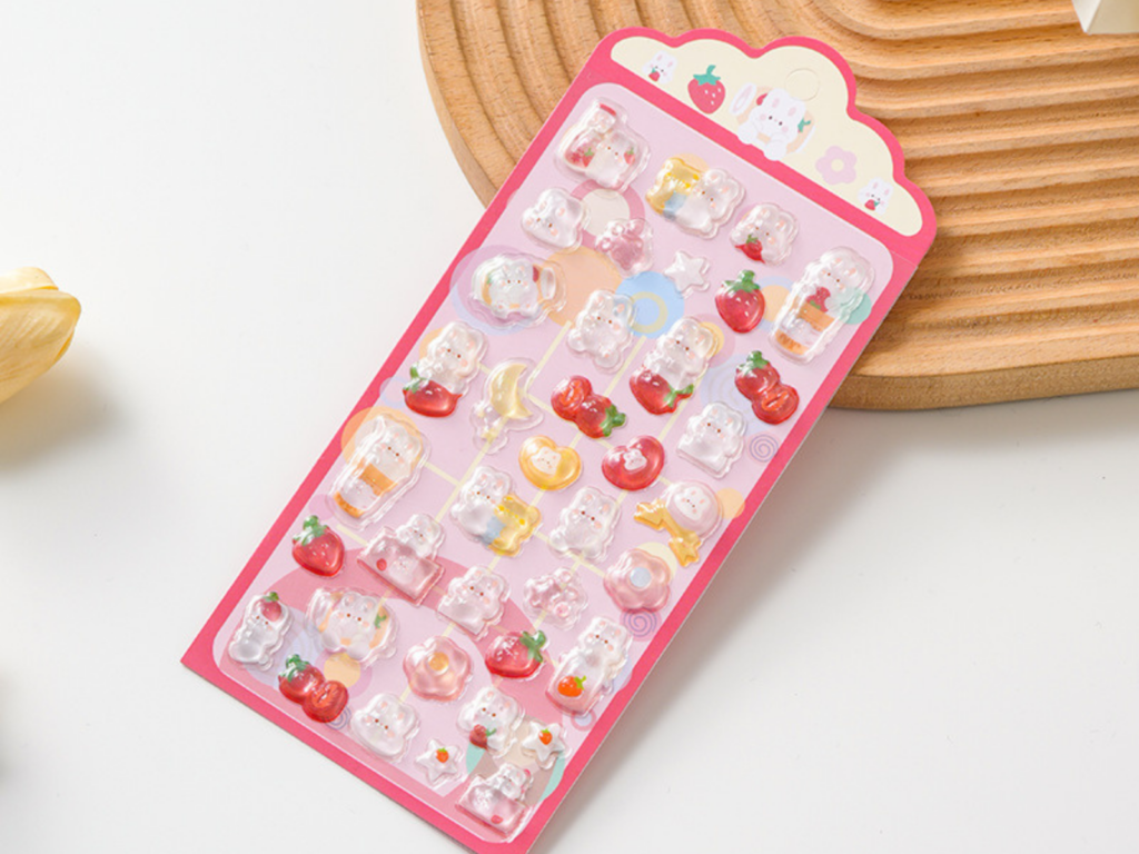 Fruit and dessert bubble stickers on a pink backing card