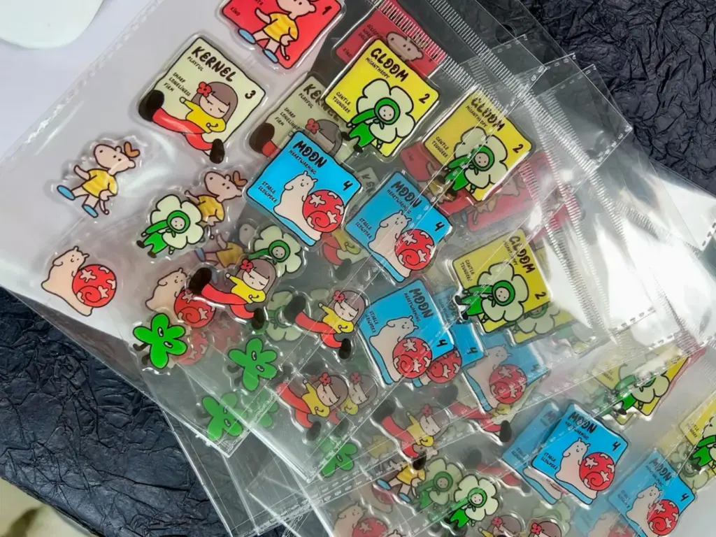 Multiple clear puffy sticker sheets laid out in individual clear bags.
