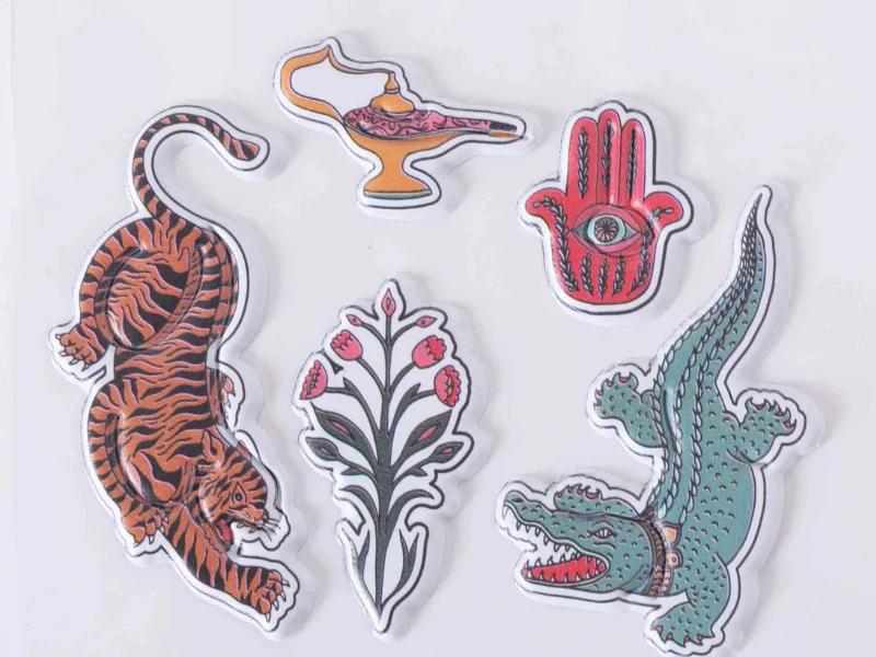 Individual kiss-cut foam puffy stickers with a glossy raised finish and clean white borders