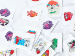 Individual kiss-cut puffy sticker singles packed separately in small clear OPP bags