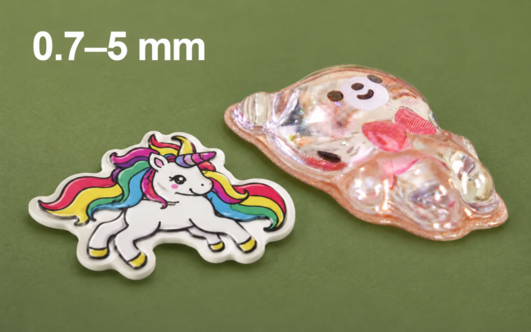 Side-by-side puffy stickers showing different thicknesses and raised profiles